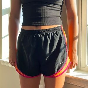 Black Nike running shorts